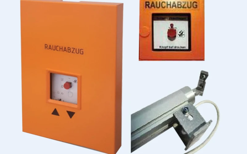 RWA-Set: orangefarbene Bedienzentrale mit der Aufschrift &bdquo;Rauchabzug&ldquo;, daneben ein Handtaster und ein Spindelantrieb.